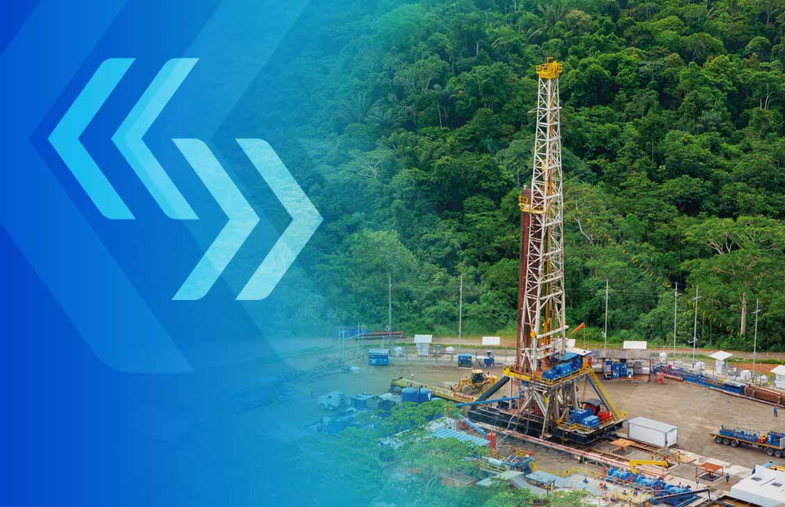 Land rig with green forest in the background.